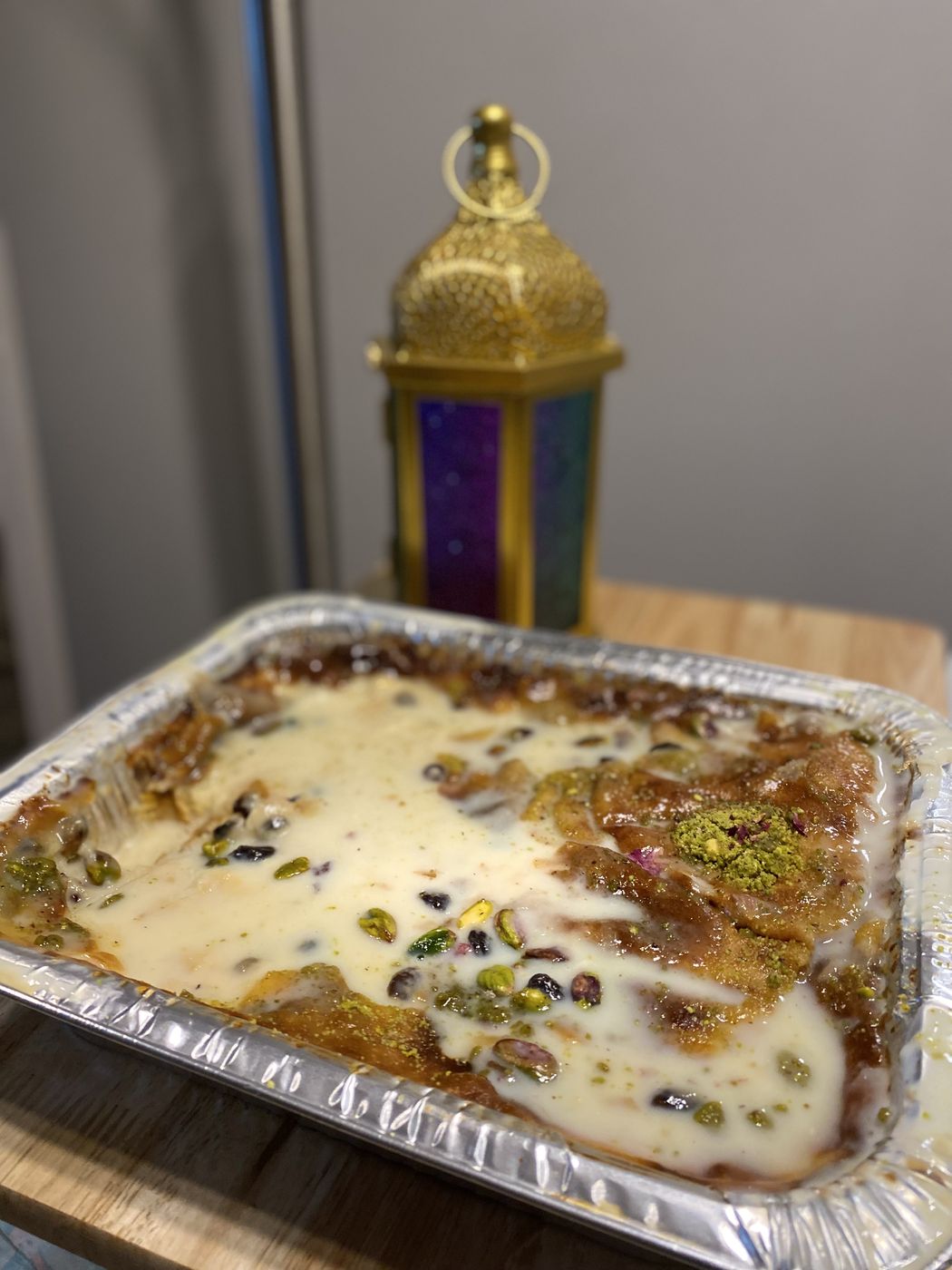 A dessert tray with cream and pistachios