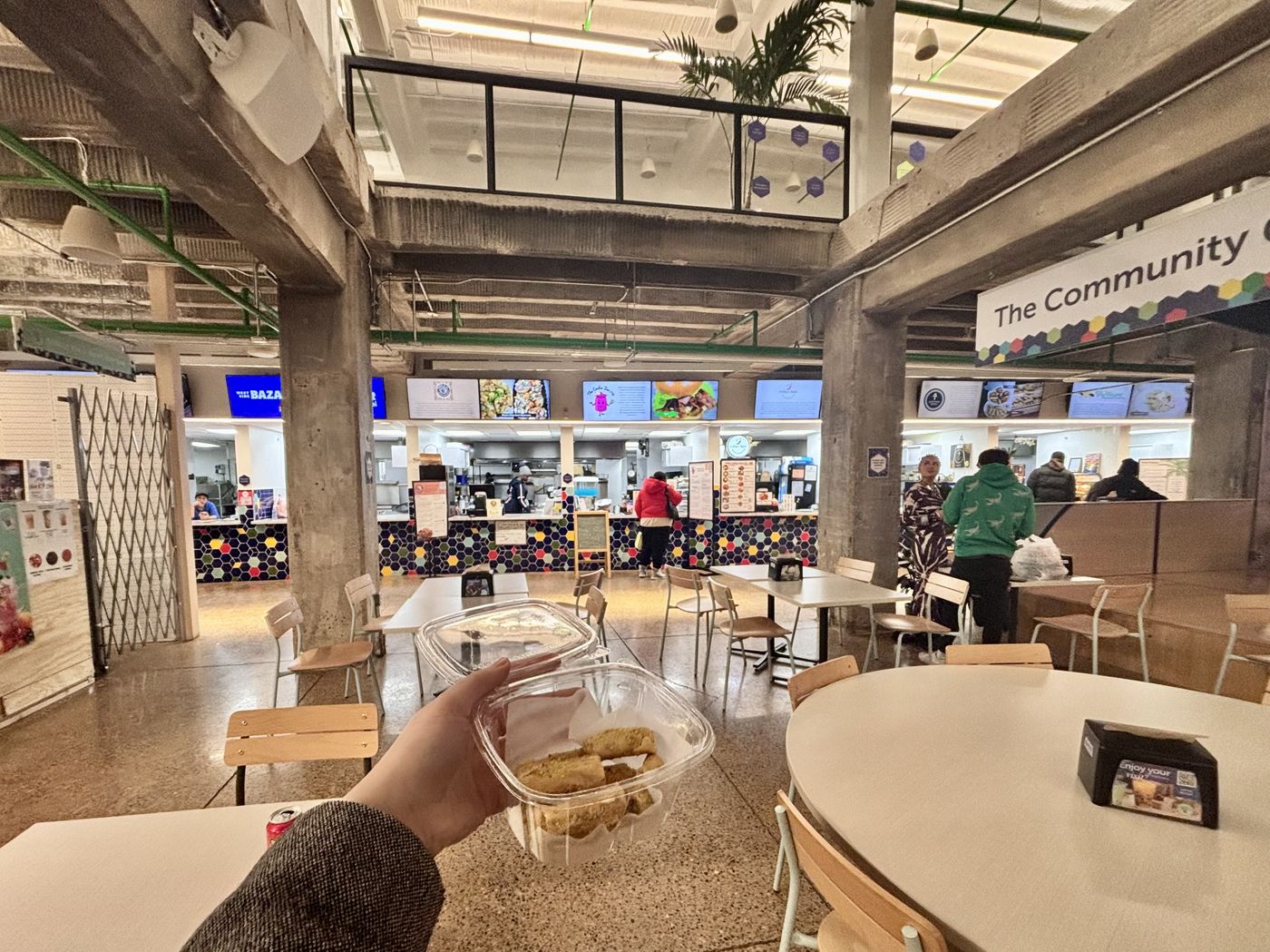 Inside the restaurant, tables and the ordering counter